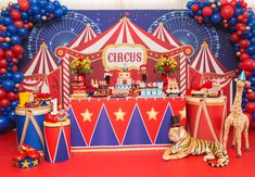 a circus themed birthday party with balloons and decorations