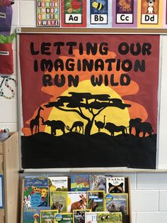 a bulletin board that says letting our imagination run wild in front of an animal theme