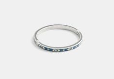 Plated brass enamel glass and cubic zirconia Pushlock closure Diameter: 2 1/2 (L) x 2 (H) Style No. CY053 Coach Outlet, H Style, Hinged Bangle, Womens Bracelets, Hinges, Womens Watches, Cubic Zirconia, Jewelry Watches, Outlet