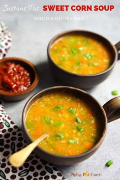 three bowls filled with soup on top of a table