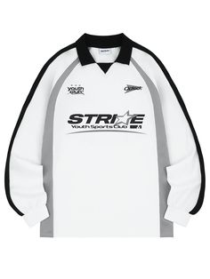 a white and black long sleeved shirt with the words strike written in black on it