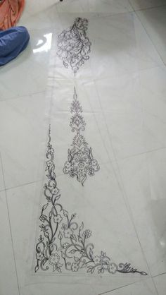 a white floor with black and white designs on it