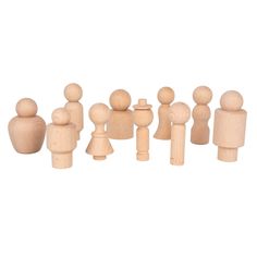 a group of wooden toy figurines sitting next to each other