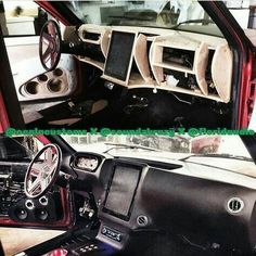 the inside of a car with its door open and speakers in it's dash