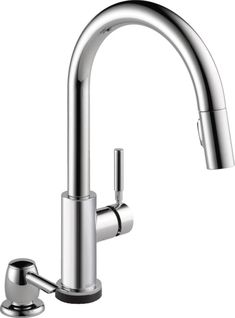 a kitchen faucet with two handles and nozzles