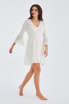 Crafted from the most comfortable knit material, it is gentle on your skin and perfect for all-day wear. The flattering V-neck design accentuates your features, allowing you to exude confidence with every step.  What sets this dress apart is the intricate openwork detailing. This unique feature adds a touch of sophistication and elegance to the dress, allowing you to make a statement wherever you go.  The Yoho Openwork V-Neck Knit Dress is available in various sizes and colors, ensuring there is Exude Confidence, Soft Textiles, Knit Mini Dress, Affordable Luxury, Fashion Jewellery, Independent Designers Fashion, Knitting Materials, Coat Dress, Badger