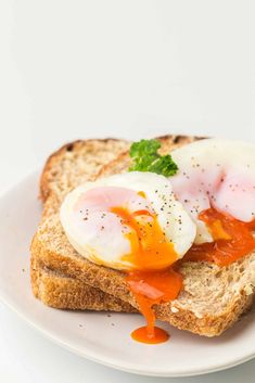 an egg on toast with ketchup and mayonnaise