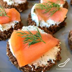 crackers topped with smoked salmon and cream cheese