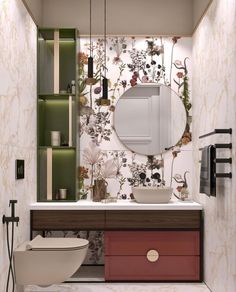 a bathroom with floral wallpaper and an oval mirror above the sink, along with a toilet