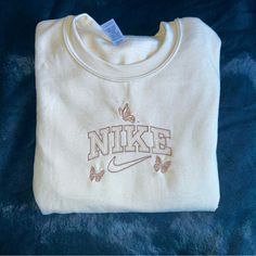 Embroidered Crewneck Super Trendy And Cute Size Small Color: Tan 50% Cotton 50 % Polyester Butterfly Crewneck, Nike Girl, Embroidered Items, Cute Crewneck, Pink Crewneck Sweatshirt, Boxy Sweater, Woven Sweater