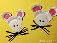 two paper plates shaped like mice on yellow background