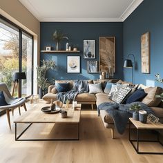 a living room with blue walls and wooden floors