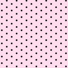 a pink background with black polka dots