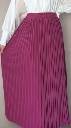 Modest high rise maxi skirt. Elastic waistband. Pleated. Fully lined for full coverage. Non-stretch Lined Maxi Skirt, Solid Non-stretch Lined Maxi Skirt, High Waist Accordion Pleats Skirt For Spring, Chic Stretch Maxi Skirt, Flowy High Waist Pleated Skirt, Chic Long Pleated Skirt With Elastic Waistband, Solid Stretch Maxi Skirt, Spring Full Length Maxi Skirt, Spring Full Length Relaxed Maxi Skirt