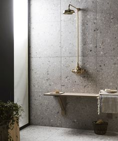 a bath room with a sink and a towel rack