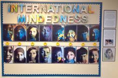 a bulletin board with pictures of people's faces and the words international minds on it