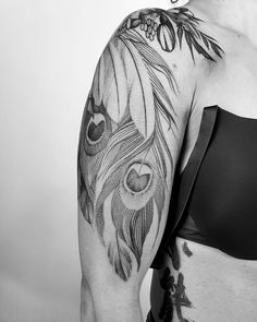 a woman with a tattoo on her arm