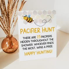 a card that says, happy hunting with a bee and honeycomb in the background