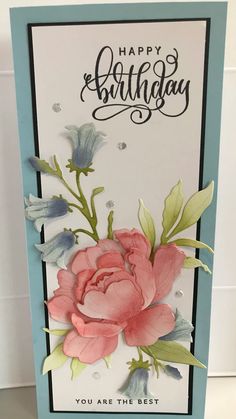 a birthday card with pink flowers on it