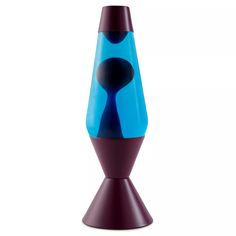 a blue and brown vase sitting on top of a table