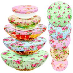 six flowered plates stacked on top of each other