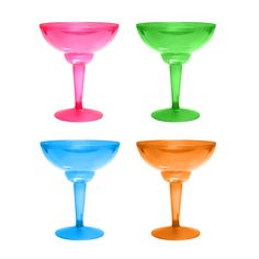 four different colored wine glasses sitting next to each other