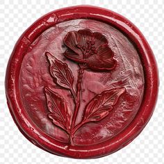 a red wax seal with two flowers on the bottom and one flower in the middle