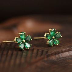 Why We Made This Our Emerald Daisy Flower Stud Earrings are a delightful blend of elegance and meaningful symbolism. The daisy flower symbolizes innocence, simplicity, and purity. Paired with the emerald green cubic zirconia, which represents renewal and growth, these earrings beautifully convey a message of fresh beginnings and pure intentions. They are a perfect gift for someone who appreciates the beauty and meaning behind these symbols. Product Details MADE FROM 925 sterling silver, emerald Mallory Aesthetic, Pure Intentions, Emerald Studs, Fresh Beginnings, Emerald Green Earrings, Emerald Earrings Studs, Flower Stud Earrings, Flower Stud, Emerald Earrings