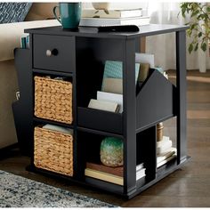 a black table with baskets and books on it