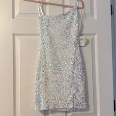 Brand New With Tags, Windsor Iridescent, Mini One Shoulder Dress With Slit In Leg Size Extra Small. Pictures Take With And Without Flash Iridescent Mini Dress, Iridescent Dress Short, Dresses Windsor, Iridescent Dress, Mini One, Windsor Dresses, Small Pictures, Windsor, Color Purple