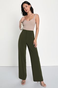 Have all the confidence you need with the Lulus A Power Mood Olive Green High-Waisted Wide Leg Trouser Pants! Lightweight crepe woven fabric shapes a boss-babe, high banded waist with a hidden zip fly and a covered button closure. Wide pant legs fall to ankle-grazing hems and feature decorative welt pockets at the back. Fit: This garment fits true to size. Length: Floor length. Size medium Inseam: 30.75 Front Rise: 12.00 Waist: Fitted - very fitted at natural waist. Hip: Fitted - consider sizing Solid Ankle-length Rayon Pants, Solid Rayon Ankle-length Pants, Chic High-waisted Wide Leg Rayon Pants, Chic Wide Leg Rayon Pants, Rayon Wide-leg Workwear Pants, Versatile Solid Rayon Pants, Versatile Solid Color Rayon Pants, Elegant Wide-leg Rayon Bottoms, Versatile Rayon Trousers