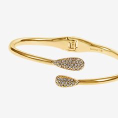 Circumference: 7 InchMetal Color: Gold ToneBracelet Type: Cuff BraceletsMetal: ZincCountry of Origin: Imported Crystal Cuff Bracelet, Monet Jewelry, Jewelry Crystal, Arm Candy, Cuff Bracelet, Cuff Bracelets, Color White, Cuff, Candy