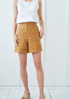 "No better way to fully appreciate the summer than wearing our ASPEN shorts. 90's inspired timeless silhouette, high waist and women's beloved, handy front pockets. FABRIC: 100% softened Lithuanian linen COLOR: Please choose a color on the side menu. STYLE: Softened linen high waist shorts with hem detail and front pockets. Inseam length is around 6 inches ( 15.5 cm). SIZE CHART: XS Bust 28- 31\" (72- 80 cm) Waist 20- 22.5\" (51- 58 cm) Hips 31.5 -34.5\" (80- 87 cm) S Bust 31.5- 35\" (80- 88 cm) Brown Linen Bottoms For Summer, Brown Linen Summer Bottoms, Summer Brown Linen Bottoms, Summer High-waisted Cargo Shorts With Relaxed Fit, Chic High-waisted Linen Shorts, Fitted Cargo Shorts For Summer, Brown Bermuda Bottoms For Summer, Summer Brown Bermuda Bottoms, High-waisted Linen Summer Shorts