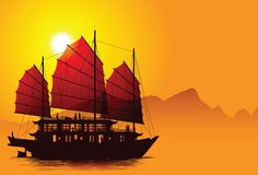 a boat with red sails in the ocean at sunset