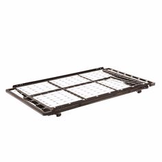 a metal bed frame with grids on the bottom and one side is black, while the other half is white