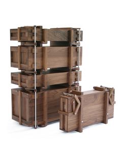 several wooden boxes stacked on top of each other