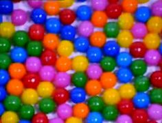 many different colored balls are scattered together