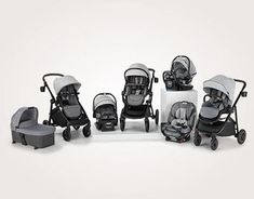 a group of baby strollers sitting next to each other on a white surface with grey trim