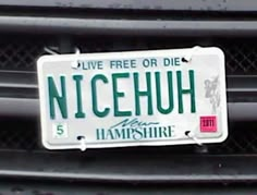 a license plate on the front of a car that says nicehun 5 hampshire