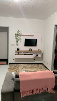 the living room is clean and ready for guests to use it as an entertainment center