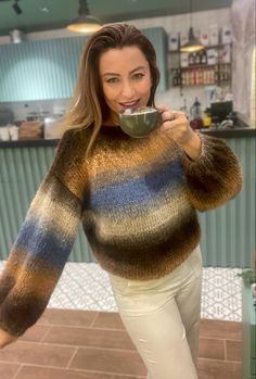 Knitted Mohair Sweater - A warm, pastel multicolored sweater! 

Elevate your winter wardrobe with our stunning ombre mohair jumper, a pastel colored masterpiece blending warmth with style. This natural tones striped sweater has brown, beige, blue blended color combination which will make your style unique from everyone else.