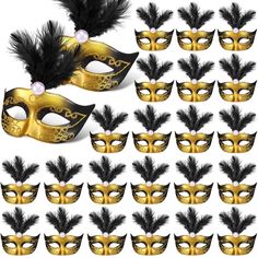 a set of masquerade masks with feathers