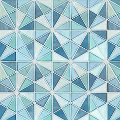 a blue and white mosaic tile wallpaper with an abstract design in shades of blue