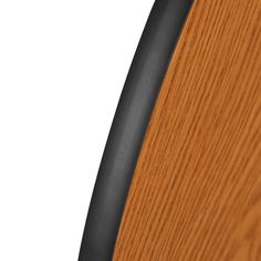 close up view of the wood grain and metal trim on a wooden door