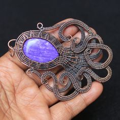 Octopus Charoite Gemstone Copper Wire Wrap Pendant, Pendant Copper Wire Pendant, Charoite Copper Jewelry, Cabochon Pendant, Gift For Her ITEM DETAILS  Item Type ~ Pendant  Gemstone Name - Charoite Metal ~ Copper Wire  Pendant Height ~  7.9 Centimeter  Pendant Width ~ 5.8 Centimeter Quantity ~ 1 Piece Cabochon Pendant, Wire Pendant, Wire Wrapped Pendant, Copper Jewelry, Copper Wire, Wire Wrapping, Copper, Jewelry Necklace Pendant, Jewelry Necklaces