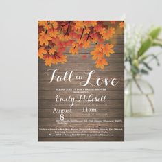 an autumn wedding card with fall leaves on it