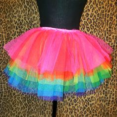 Nwt Club Exx Tutu Skirt Size Xs From Dolls Kill Elastic Waist Waist Measures 13" Unstretched Up To 17" Length 14" Club Exx Just Dance Tutu Skirt Cuz Life's A Celebration. This Mini Skirt Comes In A Layered Tulle Construction, With An Elastic Waistband, And Rainbow Pattern. Pink Fitted Halloween Skirt, Pink Mini Skirt For Costume Party, Can-can Skirt For Costume Party, Spring Party Can-can Petticoat, Spring Costume Skirt With Attached Cancan, Rainbow Skirt For Spring Party, Multicolor Skirt For Costume Party, Party Petticoat With Attached Cancan, Party Mini Skirt With Ruffles In Purple