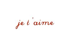 the word je t'aime written in red ink