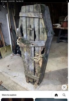 an old wooden door with vines growing out of it