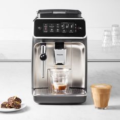 an espresso machine is being used to make coffee